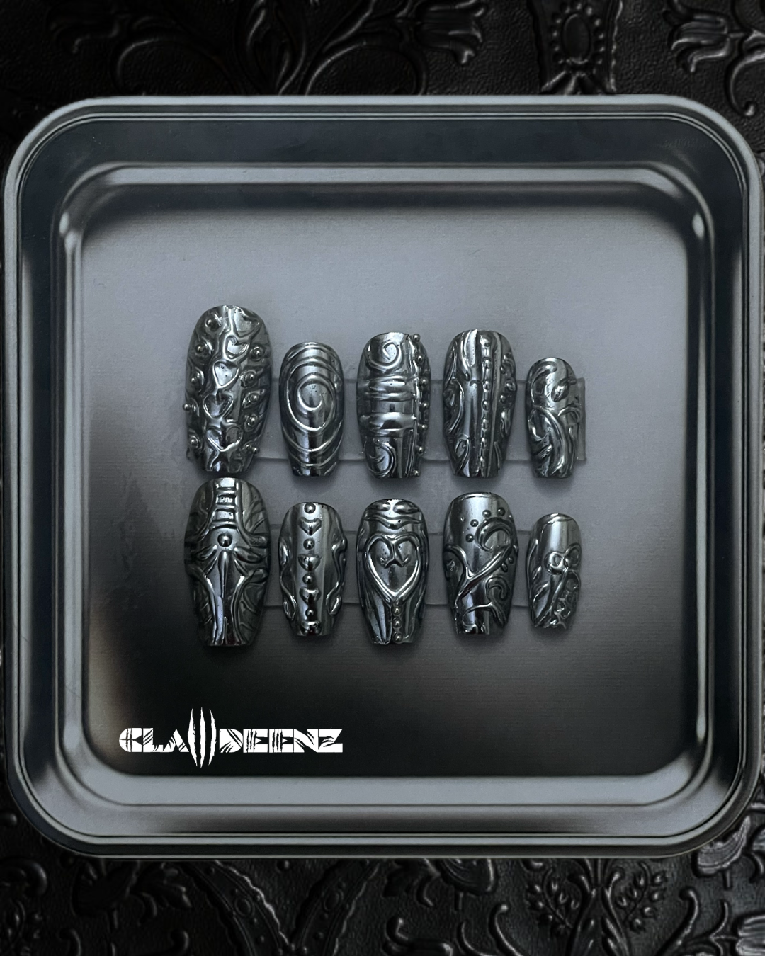 Silver chrome embossed nails